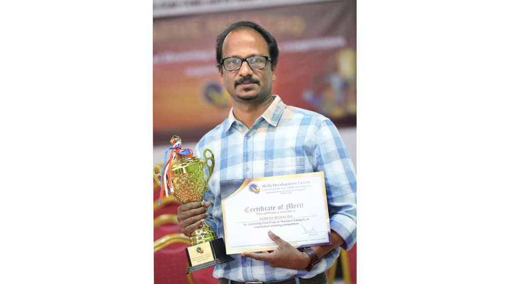 M.E.S STAFFER WINS FIRST PRIZE IN ART COMPETITIO